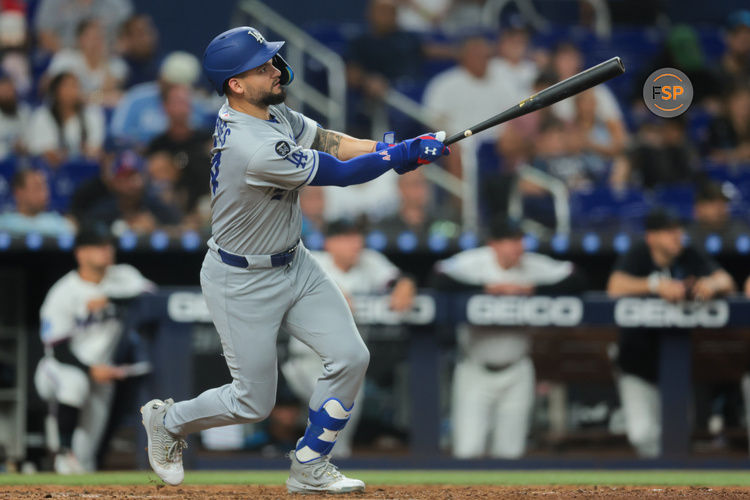 May 5, 2025; Miami, Florida, USA; Los Angeles Dodgers center fielder Andy Pages (44) hits a triple against the Miami Marlins during the eighth inning at loanDepot Park. Credit: Sam Navarro-Imagn Images
