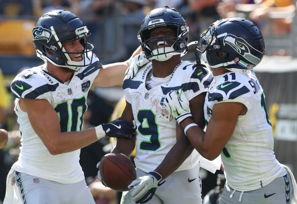 Sep 14, 2025; Pittsburgh, Pennsylvania, USA;  Seattle Seahawks wide receivers Cooper Kupp (10) and Jaxon Smith-Njigba (11) congratulate running back Kenneth Walker III (9) on his touchdown against the Pittsburgh Steelers during the fourth quarter at Acrisure Stadium. Mandatory Credit: Charles LeClaire-Imagn Images