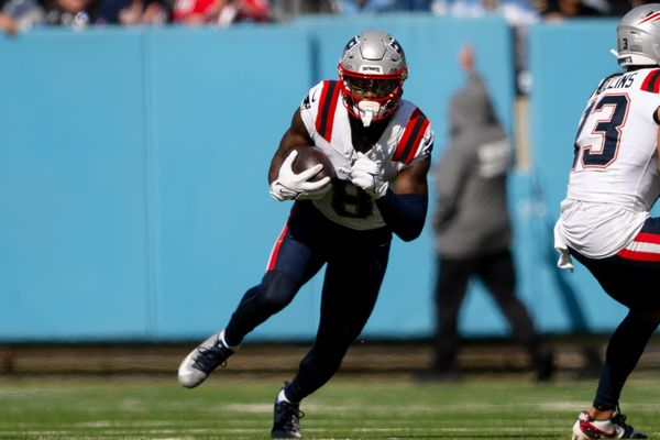 Oct 19, 2025; Nashville, Tennessee, USA;  New England Patriots wide receiver Stefon Diggs (8) runs with the ball after a made catch against the Tennessee Titans during the second half at Nissan Stadium. Mandatory Credit: Steve Roberts-Imagn Images