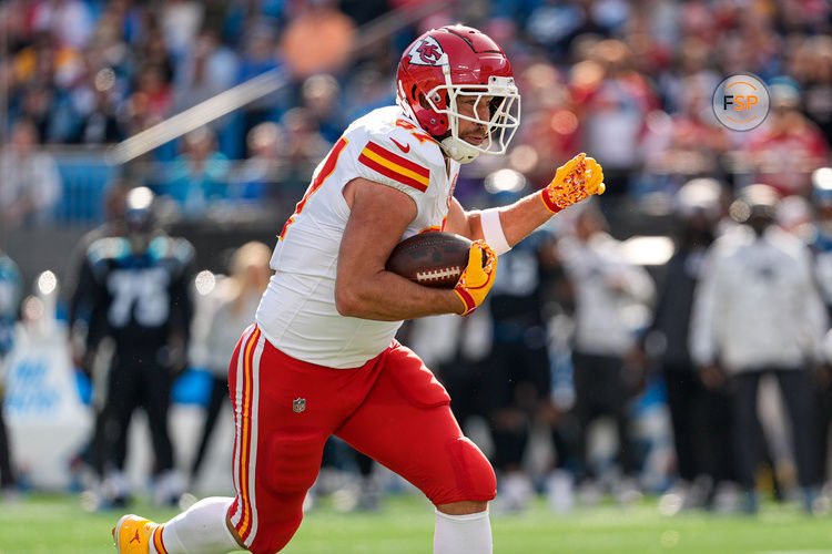 Nov 24, 2024; Charlotte, North Carolina, USA; Kansas City Chiefs tight end Travis Kelce (87) runs with the ball during the first quarter against the Carolina Panthers at Bank of America Stadium. Credit: Jim Dedmon-Imagn Images