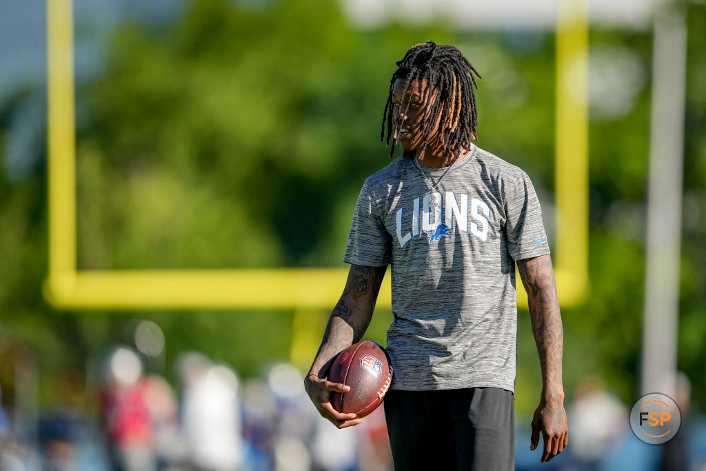 ALLEN PARK, MICHIGAN - JULY 29: Jameson Williams #18 of the Detroit Lions looks on during the Detroit Lions Training Camp at the Lions Headquarters and Training Facility on July 29, 2022 in Allen Park, Michigan. (Photo by Nic Antaya/Getty Images)