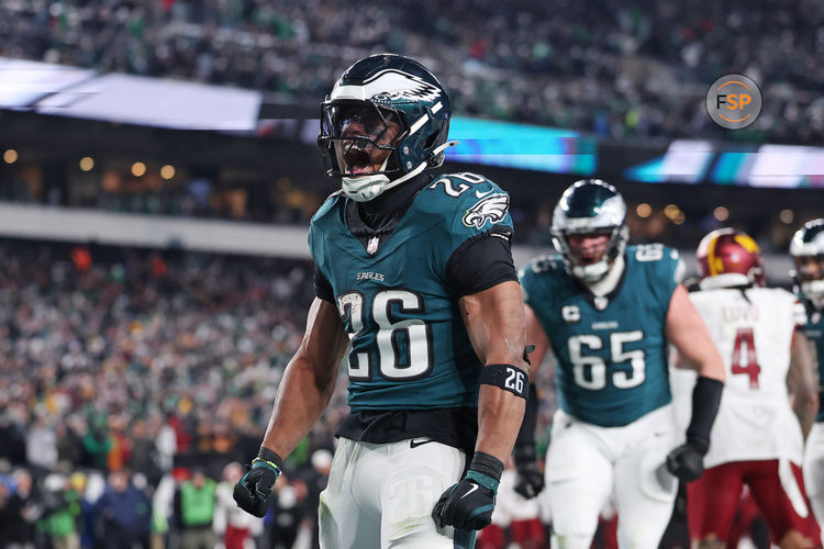 Jan 26, 2025; Philadelphia, PA, USA; Philadelphia Eagles running back Saquon Barkley (26) celebrates after a touchdown against the Washington Commanders during the second half in the NFC Championship game at Lincoln Financial Field. Credit: Bill Streicher-Imagn Images