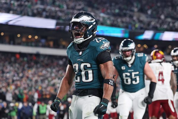 Jan 26, 2025; Philadelphia, PA, USA; Philadelphia Eagles running back Saquon Barkley (26) celebrates after a touchdown against the Washington Commanders during the second half in the NFC Championship game at Lincoln Financial Field. Mandatory Credit: Bill Streicher-Imagn Images