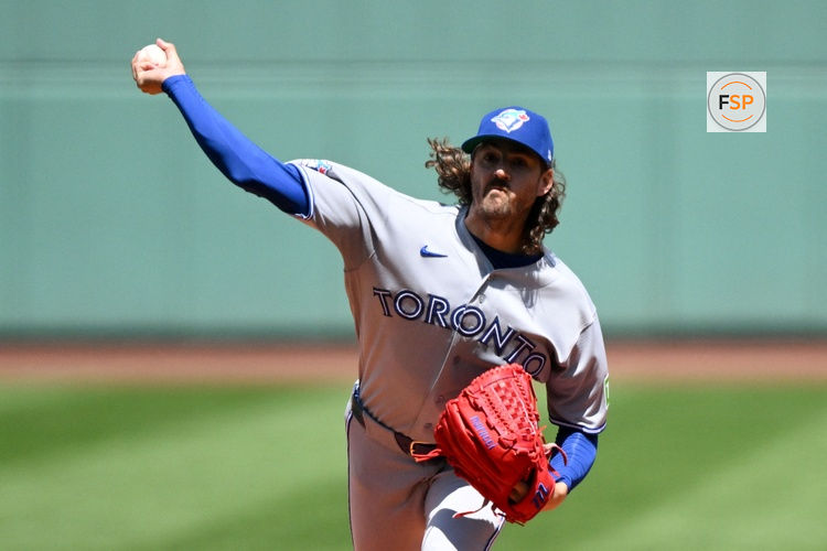 Jul 26, 2026; Boston, Massachusetts, USA; Toronto Blue Jays pitcher Kevin Gausman (34) pitches against the Boston Red Sox during the first inning at Fenway Park. Credit: Brian Fluharty-Imagn Images