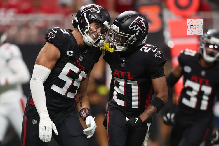 Sep 7, 2025; Atlanta, Georgia, USA; Atlanta Falcons linebacker Kaden Elliss (left) celebrates with cornerback Mike Hughes (21) after making a tackle against the Tampa Bay Buccaneers during the first quarter at Mercedes-Benz Stadium. Credit: Brett Davis-Imagn Images