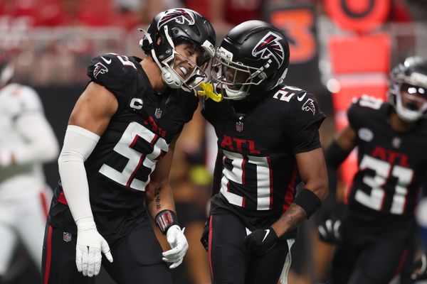 Sep 7, 2025; Atlanta, Georgia, USA; Atlanta Falcons linebacker Kaden Elliss (left) celebrates with cornerback Mike Hughes (21) after making a tackle against the Tampa Bay Buccaneers during the first quarter at Mercedes-Benz Stadium. Mandatory Credit: Brett Davis-Imagn Images