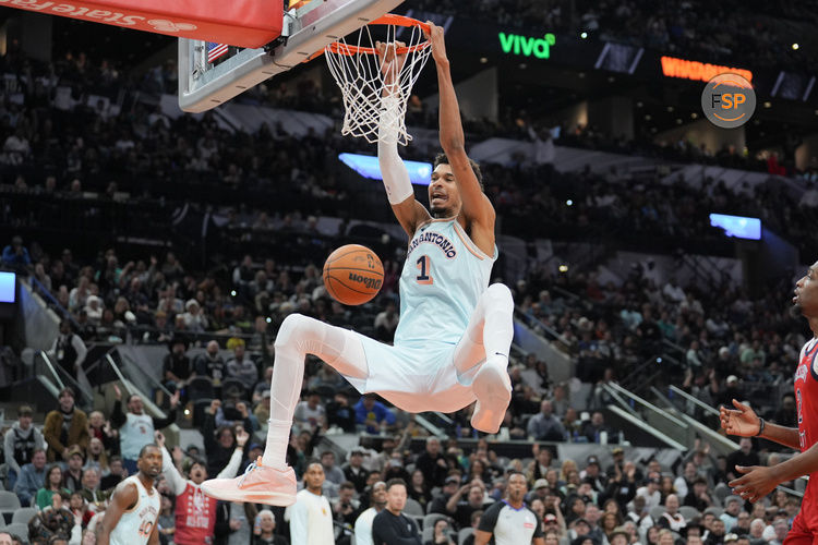 Dec 8, 2024; San Antonio, Texas, USA;  San Antonio Spurs center Victor Wembanyama (1) dunks in the second half against the New Orleans Pelicans at Frost Bank Center. Credit: Daniel Dunn-Imagn Images