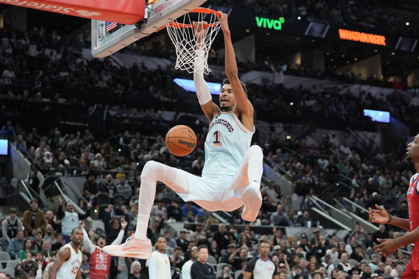 Dec 8, 2024; San Antonio, Texas, USA;  San Antonio Spurs center Victor Wembanyama (1) dunks in the second half against the New Orleans Pelicans at Frost Bank Center. Mandatory Credit: Daniel Dunn-Imagn Images