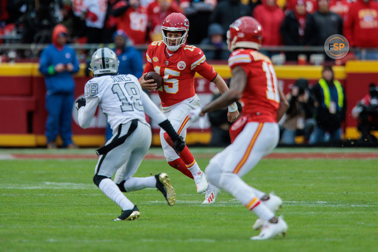 KANSAS CITY, MO - DECEMBER 25: Kansas City Chiefs quarterback Patrick Mahomes (15) scrambles in the back field during the second half against the Las Vegas Raiders on December 25th, 2023 at Arrowhead Stadium in Kansas City, Missouri. (Photo by William Purnell/Icon Sportswire)