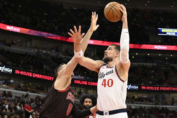 Jan 20, 2026; Chicago, Illinois, USA; LA Clippers center Ivica Zubac (40) shoots against Chicago Bulls center Nikola Vucevic (9) during the first half at United Center. Mandatory Credit: Matt Marton-Imagn Images