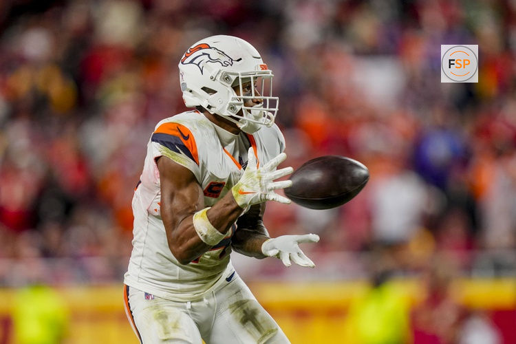 Dec 25, 2025; Kansas City, Missouri, USA;  Denver Broncos wide receiver Courtland Sutton (14) catches a pass during the third quarter at GEHA Field at Arrowhead Stadium. Credit: Jay Biggerstaff-Imagn Images