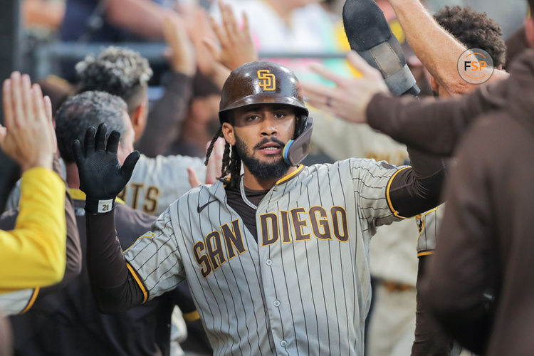 CHICAGO, IL - SEPTEMBER 30: San Diego Padres right fielder Fernando Tatis Jr. (23) is greeted in the dugout 
during a Major League Baseball game between the San Diego Padres and the Chicago White Sox on September 30, 2023 at Guaranteed Rate Field in Chicago, IL. (Photo by Melissa Tamez/Icon Sportswire)