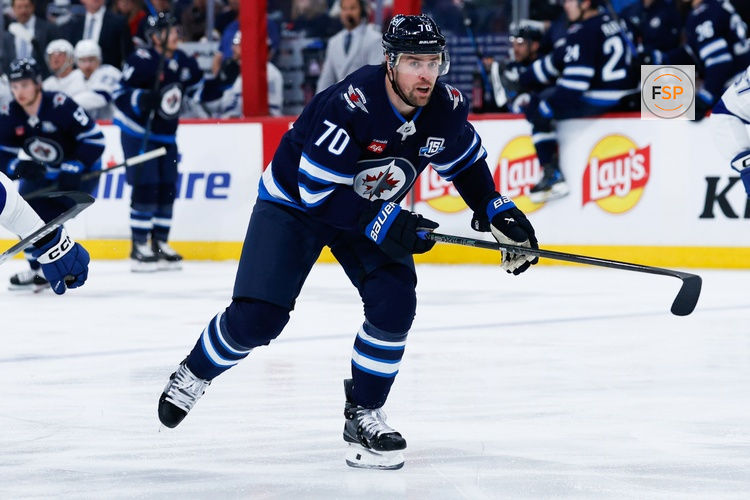 Mar 5, 2026; Winnipeg, Manitoba, CAN;  Winnipeg Jets forward Tanner Pearson (70) skates into the Tampa Bay Lightning zone during the second period at Canada Life Centre. Credit: Terrence Lee-Imagn Images