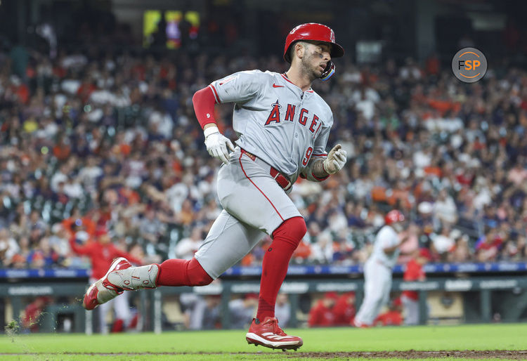 Sep 22, 2024; Houston, Texas, USA; Los Angeles Angels shortstop Zach Neto (9) runs to first base on a bases-clearing double during the ninth inning against the Houston Astros at Minute Maid Park. Credit: Troy Taormina-Imagn Images