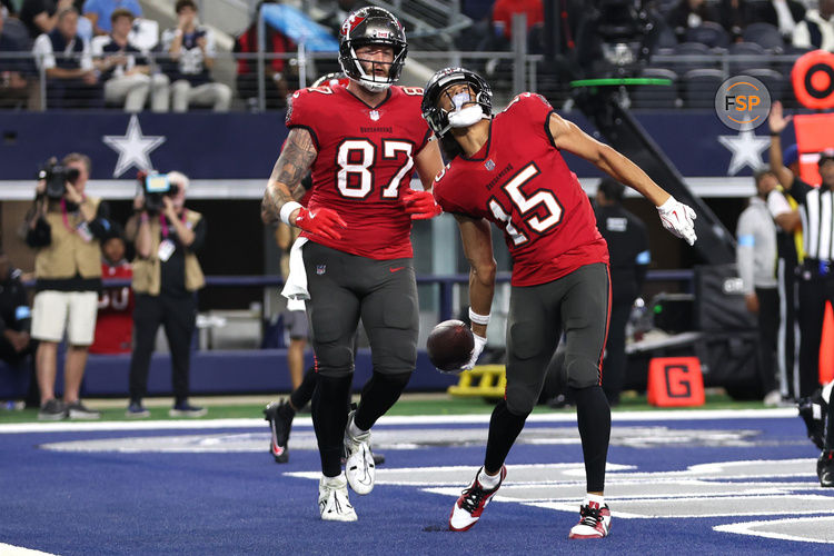 Dec 22, 2024; Arlington, Texas, USA; Tampa Bay Buccaneers wide receiver Jalen McMillan (15) reacts after scoring a touchdown against the Dallas Cowboys in the second quarter at AT&T Stadium. Credit: Tim Heitman-Imagn Images