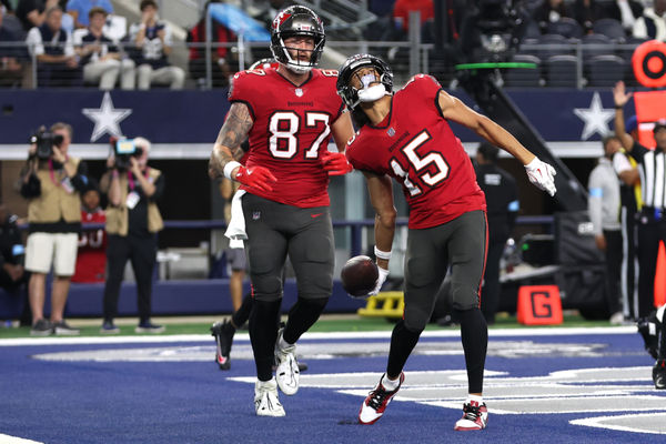 Dec 22, 2024; Arlington, Texas, USA; Tampa Bay Buccaneers wide receiver Jalen McMillan (15) reacts after scoring a touchdown against the Dallas Cowboys in the second quarter at AT&T Stadium. Mandatory Credit: Tim Heitman-Imagn Images