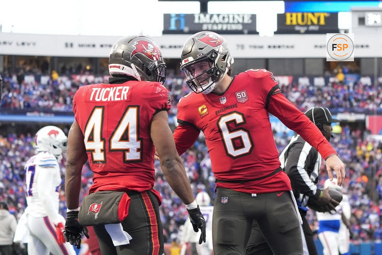 Nov 16, 2025; Orchard Park, New York, USA;  Tampa Bay Buccaneers running back Sean Tucker (44) celebrates a touchdown against the Buffalo Bills with quarterback Baker Mayfield (6) during the second half of the game at Highmark Stadium. Credit: Gregory Fisher-Imagn Images
