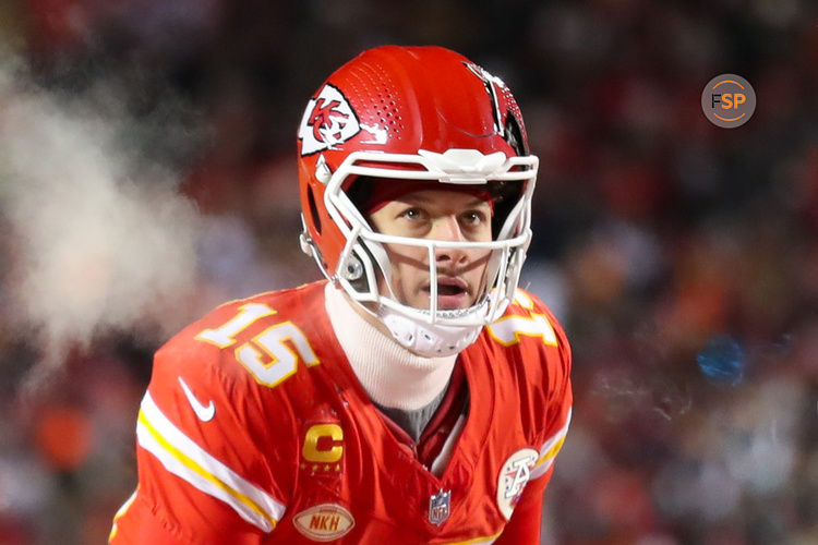 KANSAS CITY, MO - JANUARY 13: Kansas City Chiefs quarterback Patrick Mahomes (15) looks up before the snap in the fourth quarter of an AFC Wild Card playoff game between the Miami Dolphins and Kansas City Chiefs on Jan 13, 2024 at GEHA Field at Arrowhead Stadium in Kansas City, MO. (Photo by Scott Winters/Icon Sportswire)