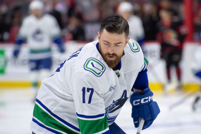 Nov 23, 2024; Ottawa, Ontario, CAN; Vancouver Canucks defenseman Filip Hronek (17) skates with the puck during warmup prior to game against the Ottawa Senators at the Canadian Tire Centre. Mandatory Credit: Marc DesRosiers-Imagn Images