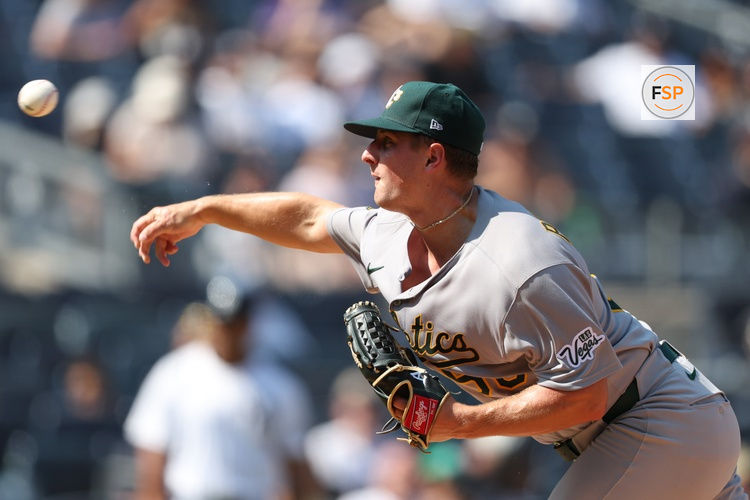 Jun 28, 2025; Bronx, New York, USA; Athletics pitcher Jack Perkins (50) delivers a pitch during the ninth inning against the New York Yankees at Yankee Stadium. Credit: Vincent Carchietta-Imagn Images