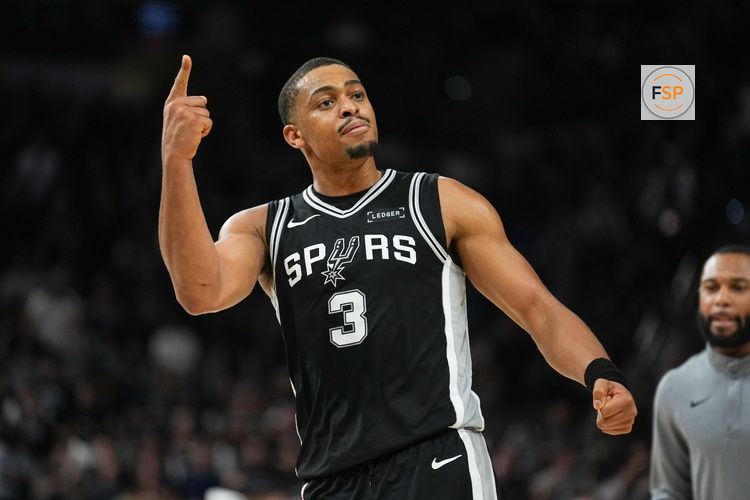 Nov 18, 2025; San Antonio, Texas, USA;  San Antonio Spurs forward Keldon Johnson (3) celebrates in the second half against the Memphis Grizzlies at Frost Bank Center. Credit: Daniel Dunn-Imagn Images