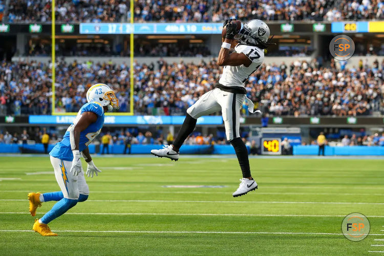 INGLEWOOD, CA - OCTOBER 1: Las Vegas Raiders wide receiver Davante Adams (17) catches the ball for a gain during the NFL regular season game between the Las Vegas Raiders and the Los Angeles Chargers on October 1, 2023, at SoFi Stadium in Inglewood, CA. (Photo by Jordon Kelly/Icon Sportswire)