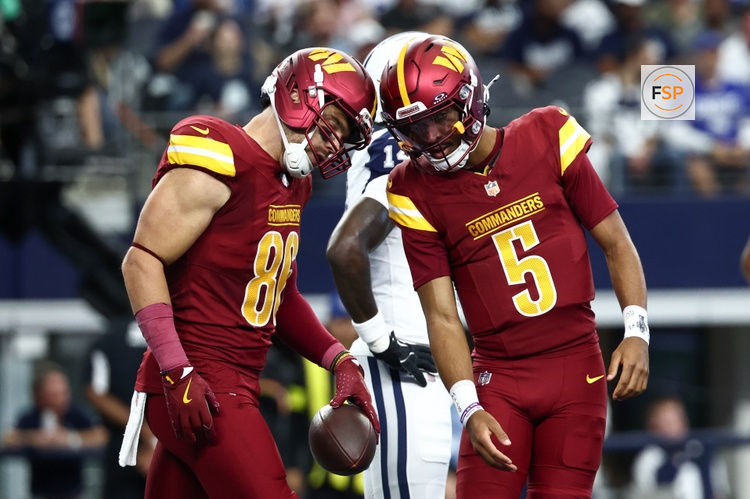 Oct 19, 2025; Arlington, Texas, USA; Washington Commanders tight end Zach Ertz (86) and quarterback Jayden Daniels (5) celebrate after scoring a touchdown against the Dallas Cowboys during the first quarter of the game at AT&T Stadium. Credit: Kevin Jairaj-Imagn Images