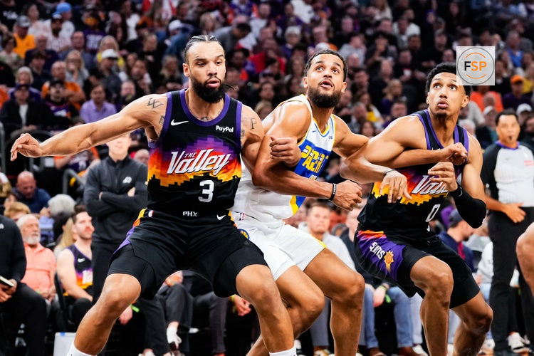 Nov 13, 2025; Phoenix, Arizona, USA; Phoenix Suns forward Dillon Brooks (3) and Phoenix Suns forward Ryan Dunn (0) during a free throw shot at Mortgage Matchup Center. Credit: Arianna Grainey-Imagn Images