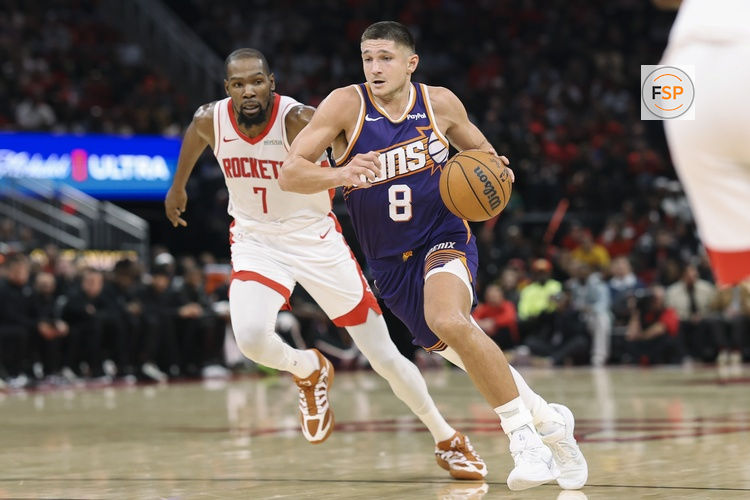 Dec 5, 2025; Houston, Texas, USA; Phoenix Suns guard Grayson Allen (8) dribbles the ball as Houston Rockets forward Kevin Durant (7) defends during the third quarter at Toyota Center. Credit: Troy Taormina-Imagn Images