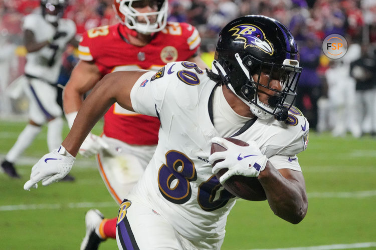 Sep 5, 2024; Kansas City, Missouri, USA; Baltimore Ravens tight end Isaiah Likely (80) runs the ball against the Kansas City Chiefs during the second half at GEHA Field at Arrowhead Stadium. Credit: Denny Medley-Imagn Images