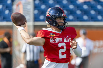 Jan 29, 2025; Mobile, AL, USA; American team quarterback Jaxson Dart of Ole Miss (2) throws the ball during Senior Bowl practice for the National team at Hancock Whitney Stadium. Mandatory Credit: Vasha Hunt-Imagn Images