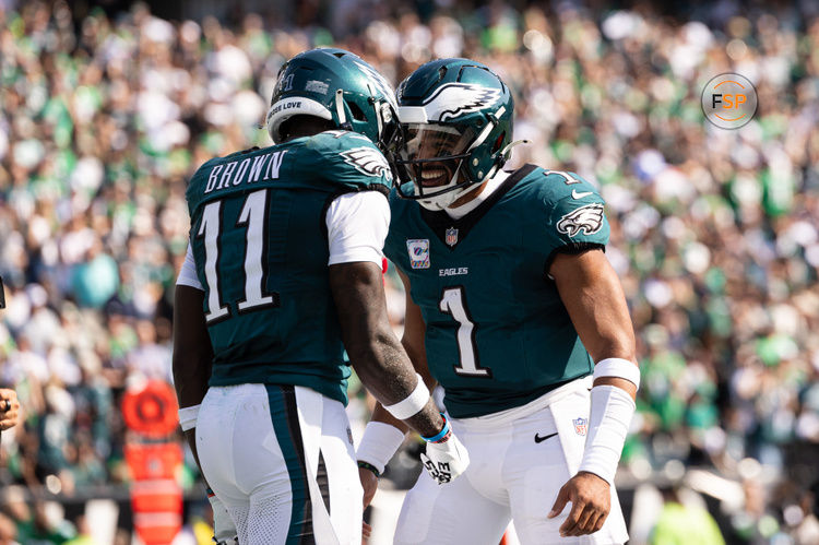 Oct 13, 2024; Philadelphia, Pennsylvania, USA; Philadelphia Eagles quarterback Jalen Hurts (1) and wide receiver A.J. Brown (11) celebrate their touchdown pass during the second quarter against the Cleveland Browns at Lincoln Financial Field. Credit: Bill Streicher-Imagn Images