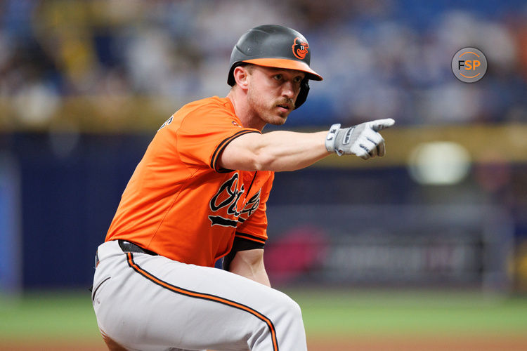 Jun 8, 2024; St. Petersburg, Florida, USA;  Baltimore Orioles third baseman Jordan Westburg (11) reacts after hitting an rbi triple against the Tampa Bay Rays in the eighth inning at Tropicana Field. Credit: Nathan Ray Seebeck-USA TODAY Sports