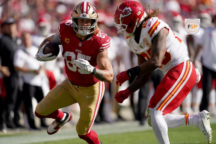 Oct 20, 2024; Santa Clara, California, USA; San Francisco 49ers tight end George Kittle (85) runs with the ball after making a catch next to Kansas City Chiefs safety Justin Reid (20) in the third quarter at Levi's Stadium. Credit: Cary Edmondson-Imagn Images