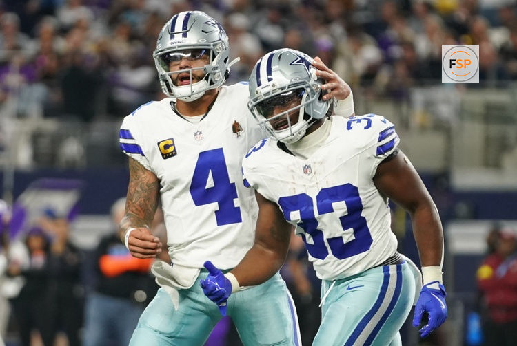 Dec 14, 2025; Arlington, Texas, USA; Dallas Cowboys running back Javonte Williams (33) celebrates with quarterback Dak Prescott (4) after a touchdown during the first half against the Minnesota Vikings at AT&T Stadium. Credit: Raymond Carlin III-Imagn Images