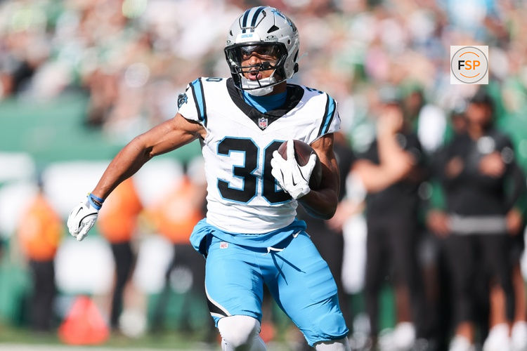 Oct 19, 2025; East Rutherford, New Jersey, USA; Carolina Panthers running back Chuba Hubbard (30) runs with the ball in the second quarter against the New York Jets at MetLife Stadium. Credit: Vincent Carchietta-Imagn Images