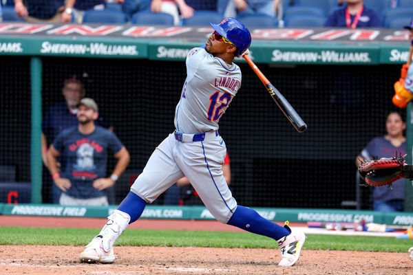CLEVELAND, OH - MAY 22: New York Mets shortstop Francisco Lindor (12) doubles during the ninth inning of the Major League Baseball Interleague game between the New York Mets and Cleveland Guardians on May 22, 2024, at Progressive Field in Cleveland, OH. (Photo by Frank Jansky/Icon Sportswire)