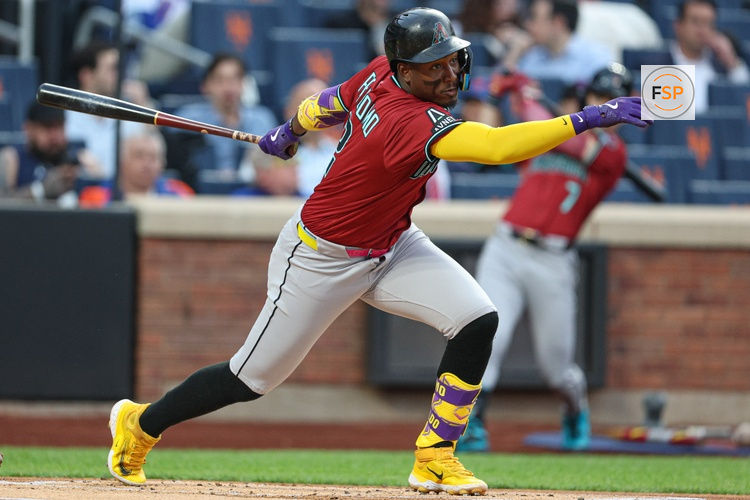 Apr 29, 2025; New York City, New York, USA; Arizona Diamondbacks shortstop Geraldo Perdomo (2) singles during the first inning against the New York Mets at Citi Field. Credit: Vincent Carchietta-Imagn Images
