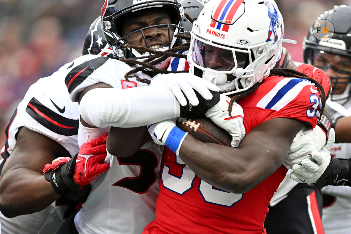 Oct 13, 2024; Foxborough, Massachusetts, USA; Houston Texans defensive end Will Anderson Jr. (51) tackles New England Patriots running back JaMycal Hasty (39) during the first half at Gillette Stadium. Credit: Brian Fluharty-Imagn Images