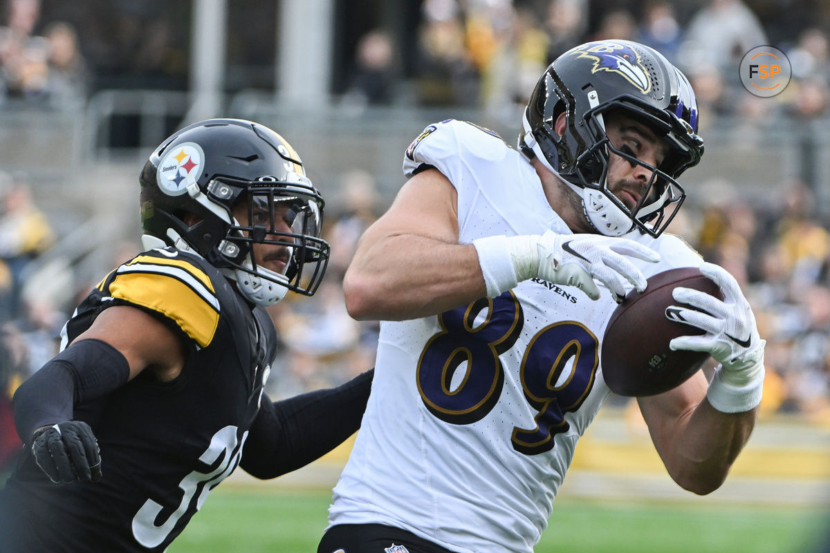 Nov 17, 2024; Pittsburgh, Pennsylvania, USA; Baltimore Ravens tight end Mark Andrews (89) catches a pass in front of Pittsburgh Steelers safety Minkah Fitzpatrick (39) during the second quarter at Acrisure Stadium. Credit: Barry Reeger-Imagn Images