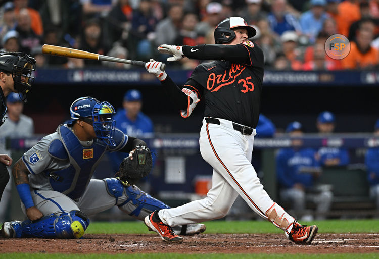 Oct 2, 2024; Baltimore, Maryland, USA; Baltimore Orioles catcher Adley Rutschman (35) hits a single against the Kansas City Royals in the fourth inning in game two of the Wild Card round for the 2024 MLB Playoffs at Oriole Park at Camden Yards. Credit: Tommy Gilligan-Imagn Images