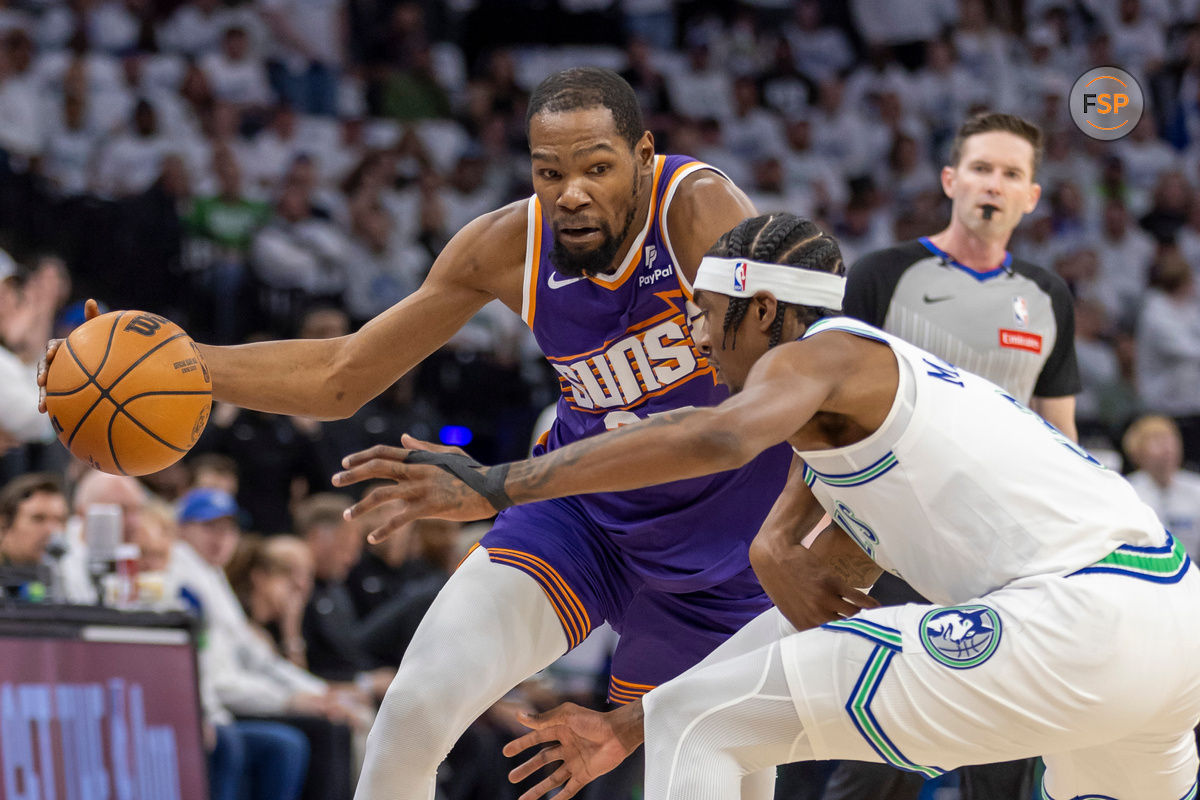 Apr 20, 2024; Minneapolis, Minnesota, USA; Phoenix Suns forward Kevin Durant (35) dribbles the ball around Minnesota Timberwolves forward Jaden McDaniels (3)] in the first half during game one of the first round for the 2024 NBA playoffs at Target Center. Credit: Jesse Johnson-USA TODAY Sports