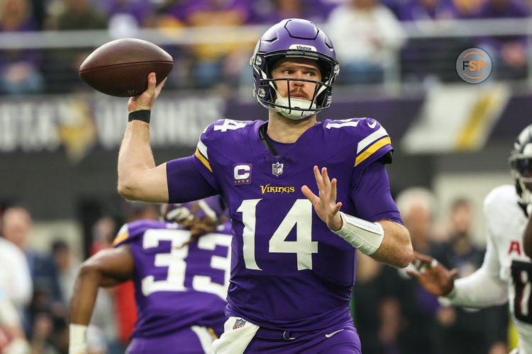 Dec 8, 2024; Minneapolis, Minnesota, USA; Minnesota Vikings quarterback Sam Darnold (14) throws the ball against the Atlanta Falcons during the first quarter at U.S. Bank Stadium. Credit: Matt Krohn-Imagn Images