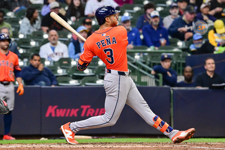 May 7, 2025; Milwaukee, Wisconsin, USA; Houston Astros shortstop Jeremy Pena (3) hits a 3-run home run in the sixth inning against the Milwaukee Brewers at American Family Field. Credit: Benny Sieu-Imagn Images