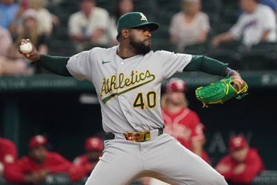 Apr 24, 2026; Arlington, Texas, USA;  Athletics pitcher Luis Severino (40) throws to the plate against the Texas Rangers during the first inning at Globe Life Field. Mandatory Credit: Raymond Carlin III-Imagn Images