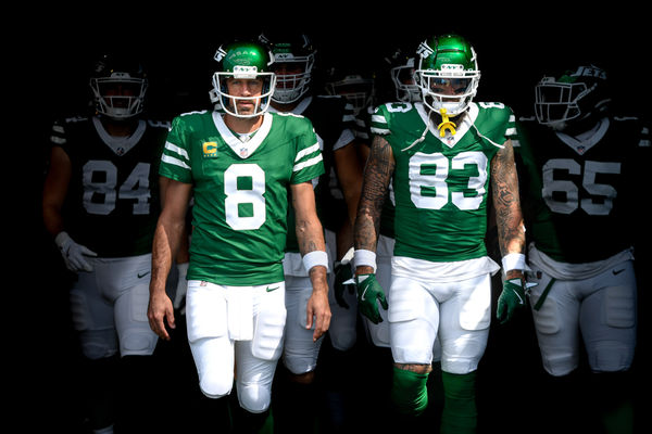 Sep 15, 2024; Nashville, Tennessee, USA;  New York Jets quarterback Aaron Rodgers (8) and tight end Tyler Conklin (83) takes the field against the Tennessee Titans during the first half at Nissan Stadium. Mandatory Credit: Steve Roberts-Imagn Images