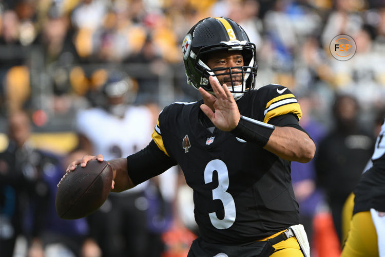 Nov 17, 2024; Pittsburgh, Pennsylvania, USA; Pittsburgh Steelers quarterback Russell Wilson (3) throws a pass against the Baltimore Ravens during the first quarter at Acrisure Stadium. Credit: Barry Reeger-Imagn Images