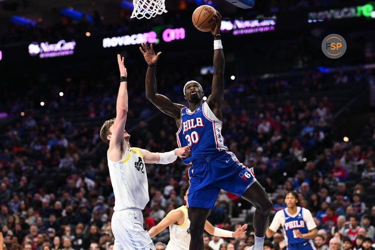 Mar 9, 2025; Philadelphia, Pennsylvania, USA; Philadelphia 76ers center Adem Bona (30) drives to shoot against Utah Jazz center Kyle Filipowski (22) in the second quarter at Wells Fargo Center. Credit: Kyle Ross-Imagn Images