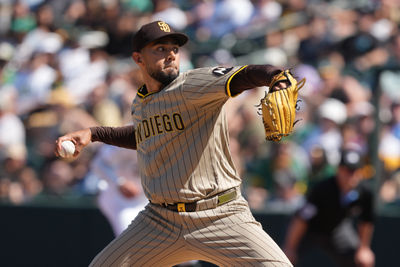 Apr 9, 2025; West Sacramento, California, USA; San Diego Padres pitcher Robert Suarez (75) throws a pitch against the Athletics during the ninth inning at Sutter Health Park. Mandatory Credit: Darren Yamashita-Imagn Images