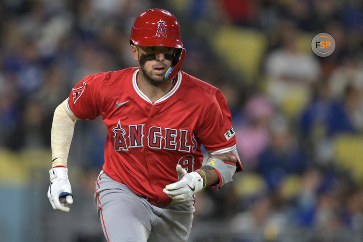 May 16, 2025; Los Angeles, California, USA; Los Angeles Angels shortstop Zach Neto (9) heads to first on a RBI double in the fourth inning against the Los Angeles Dodgers at Dodger Stadium. Credit: Jayne Kamin-Oncea-Imagn